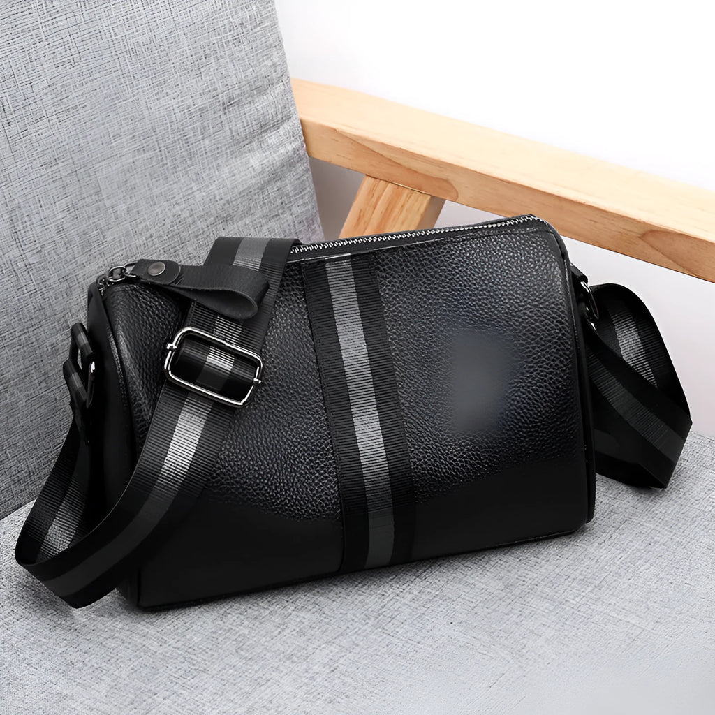 Black genuine leather one-shoulder crossbody bag with dimensions 24cm x 16cm x 13cm