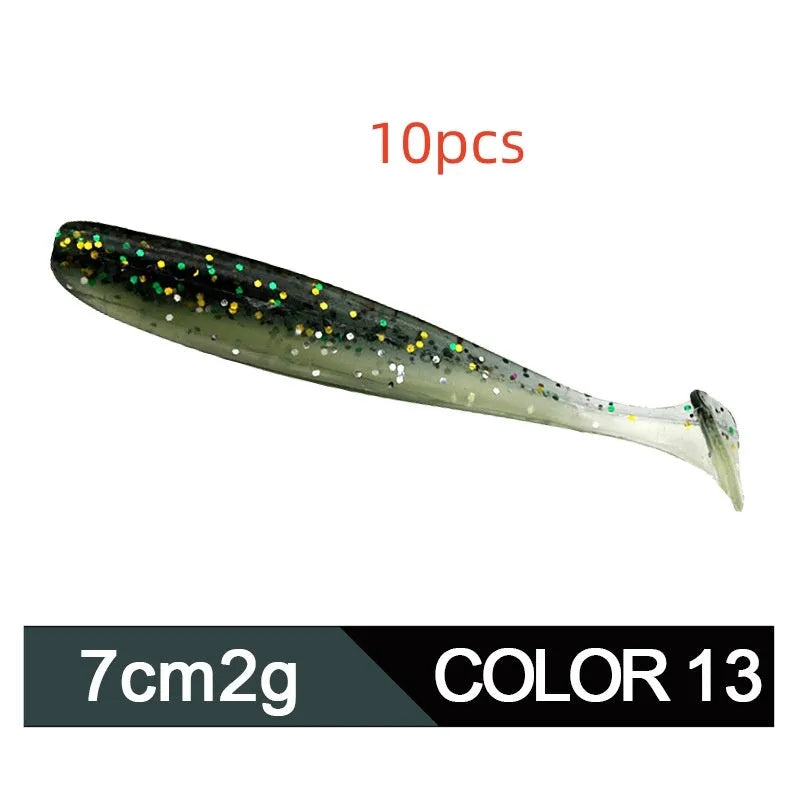 Two-tone soft plastic T-tail fishing lure measuring 7cm, shown in multiple colour variations.