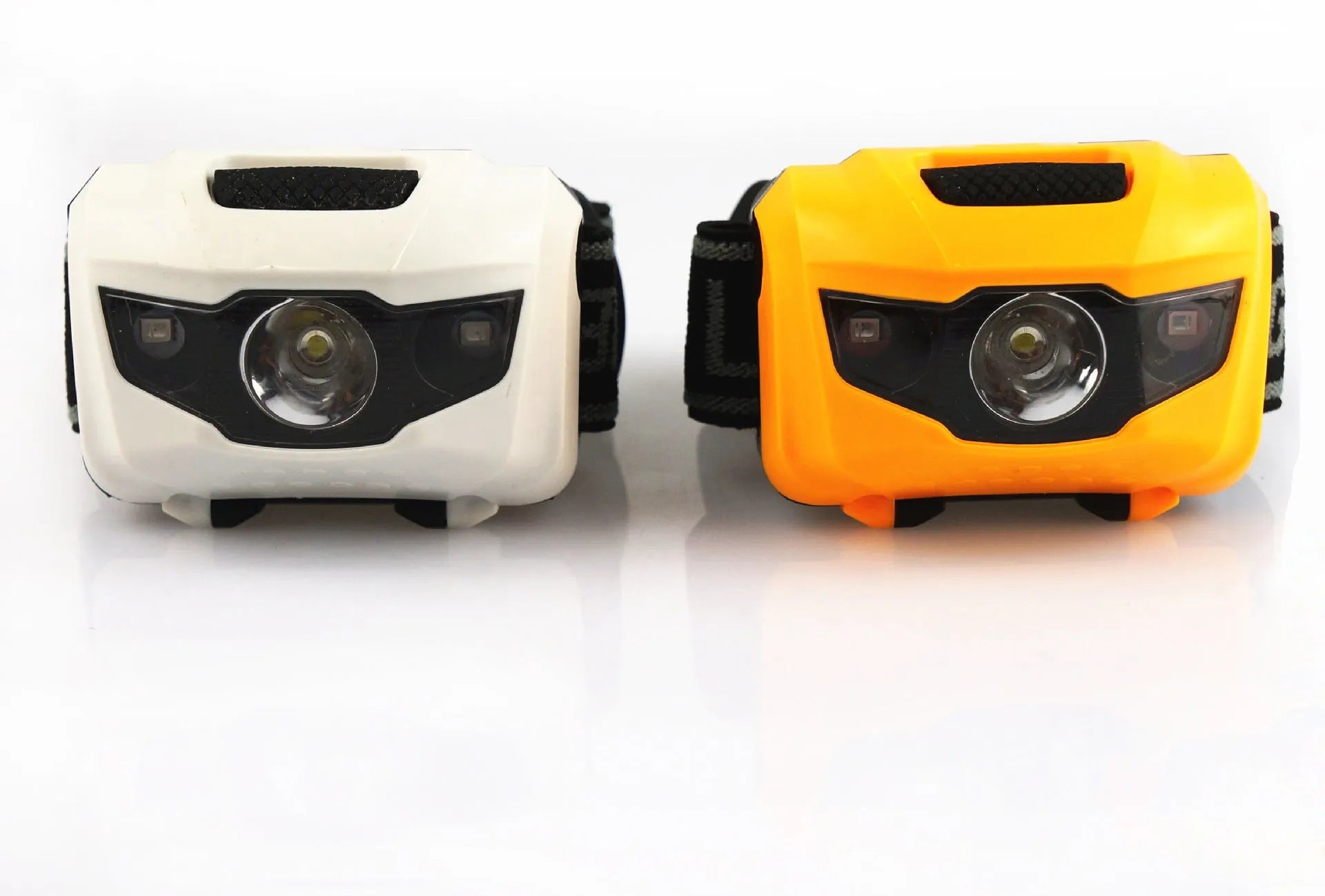 Waterproof outdoor head torch with white and red LEDs mounted on adjustable head strap