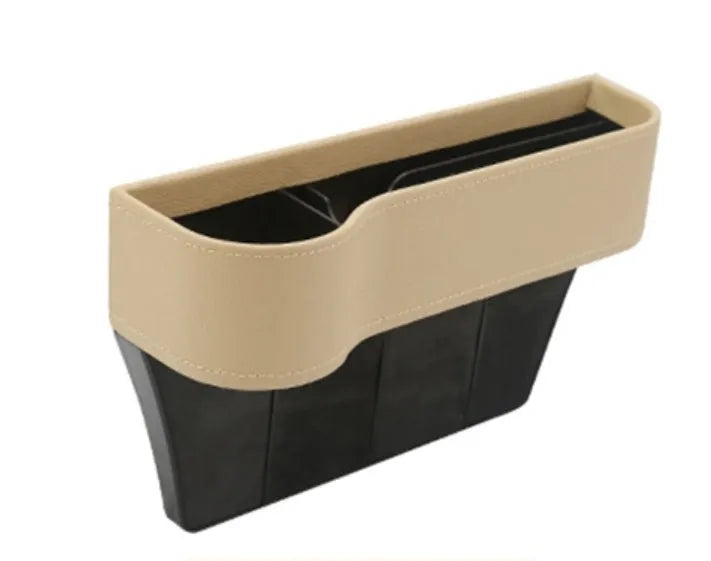PU leather car seat gap storage box in black holding a smartphone and wallet between the console and seat