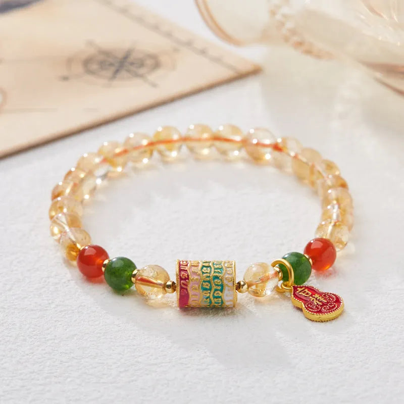 Hand-woven citrine crystal bracelet with five-sutra geometric design and 6mm beads
