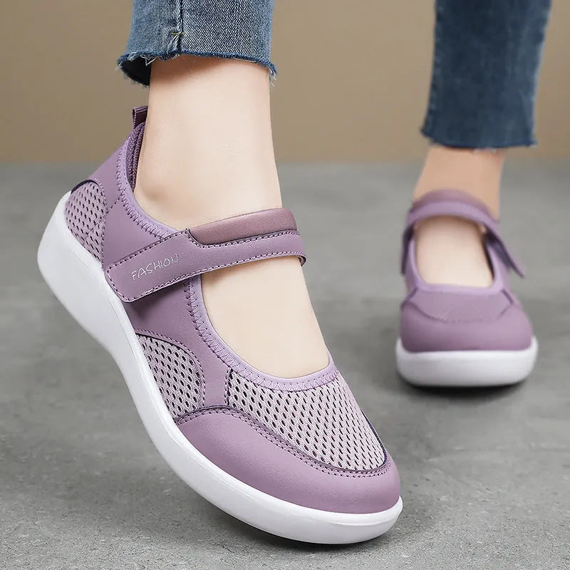 Women's grey mesh slip-on casual shoes with Velcro fastening and flat polyurethane sole