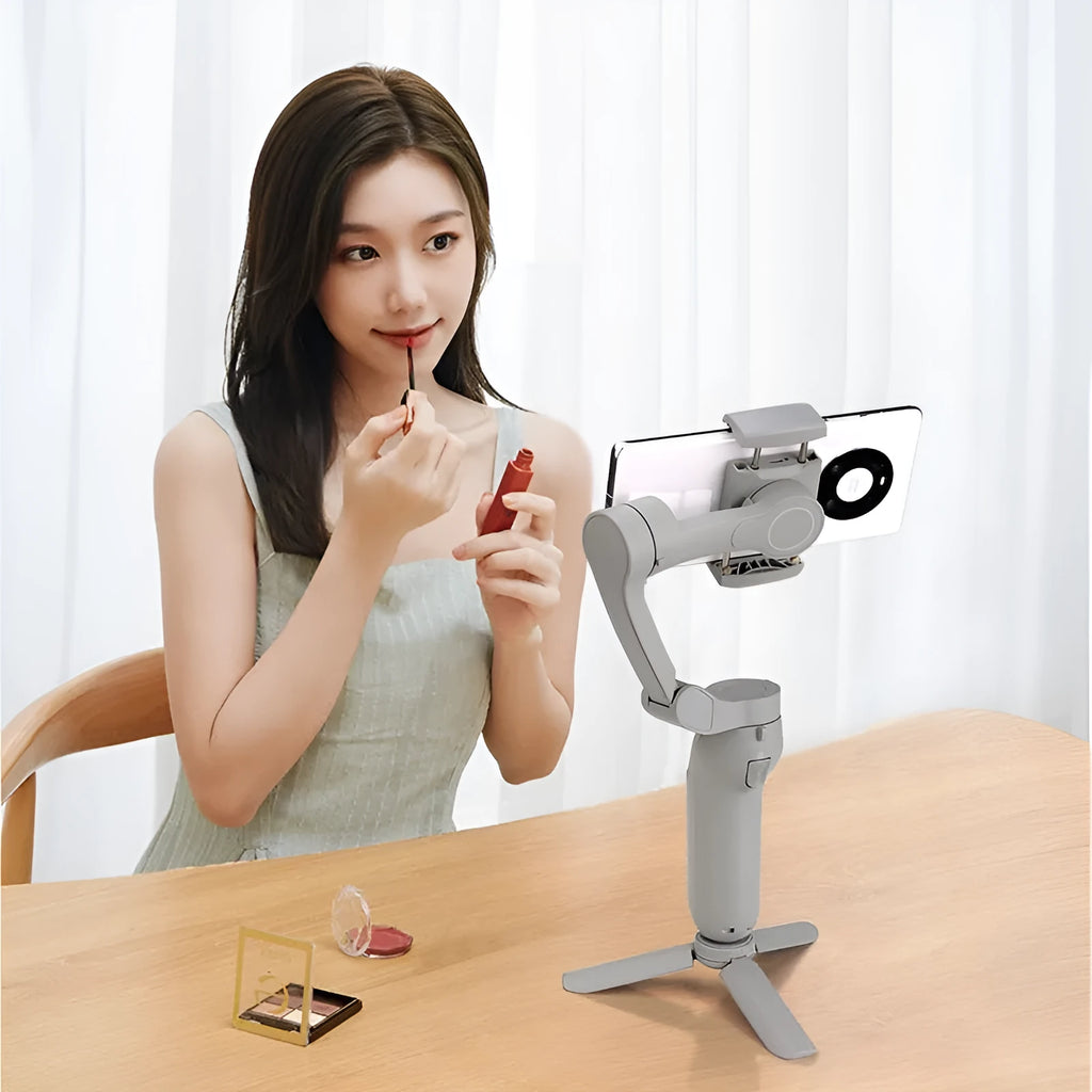 L7B PRO folding three-axis mobile phone gimbal stabiliser shown both unfolded and in compact folded position