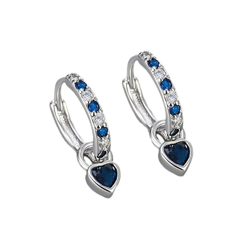 Gold-coloured clip-on earring for women with a heart-shaped drop featuring a pink zircon stone.