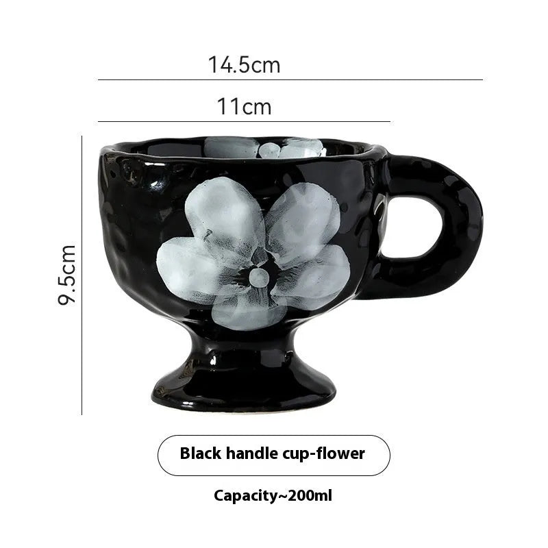 Handmade irregular solid colour ceramic mug on a table