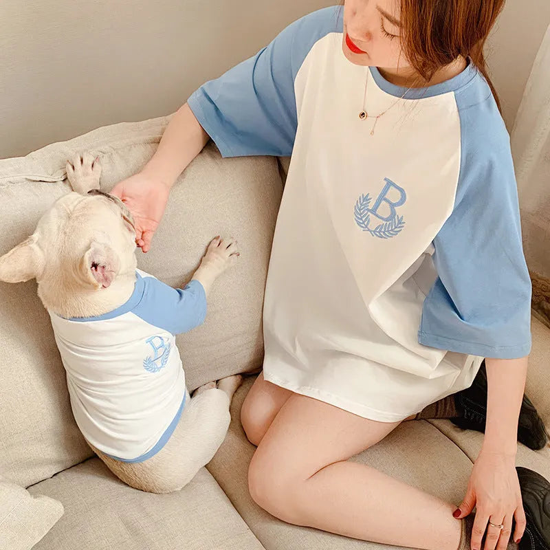 Dog wearing a short sleeve casual top in double yarn stretch Odell fabric, colour Blue