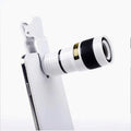 12X magnification phone telescope with mounting clip and cleaning cloth on a white background.
