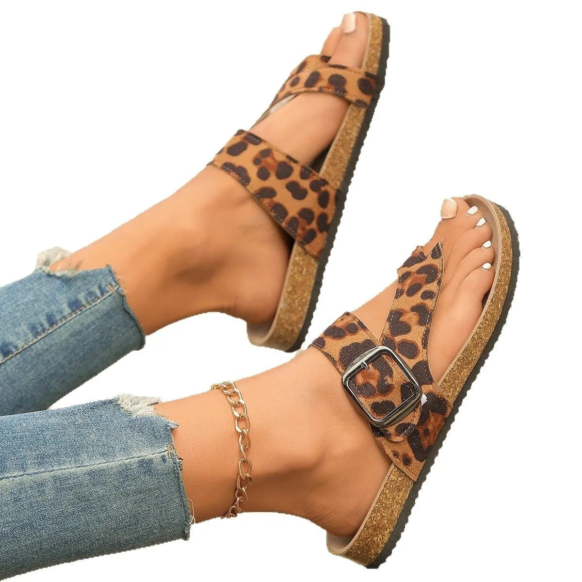 Leopard print Roman style slippers with covering toe and wooden sole.