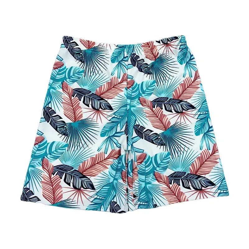 Men's cropped beach swimming trunks in multicolour leaf pattern with briefs style
