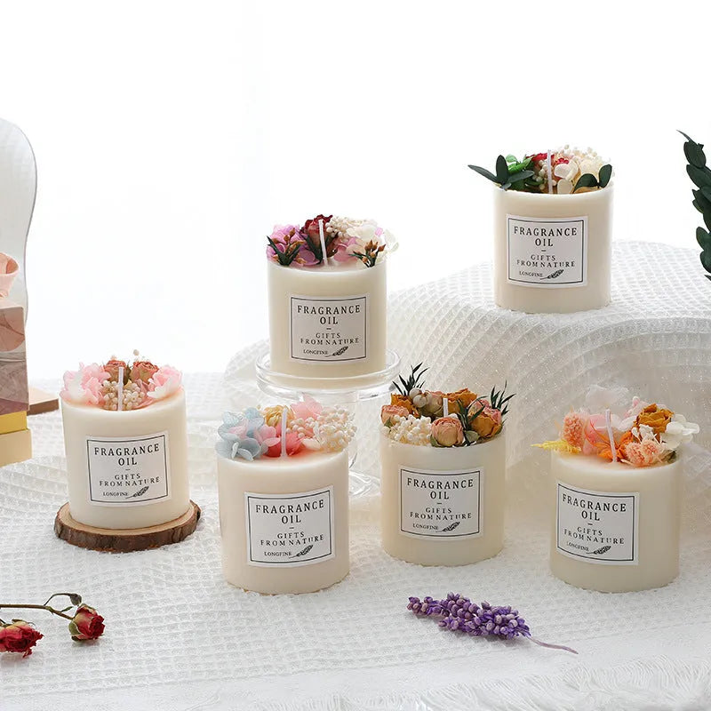 Decorative dried flower scented candle with choice of nine aromas on a wooden chip base.