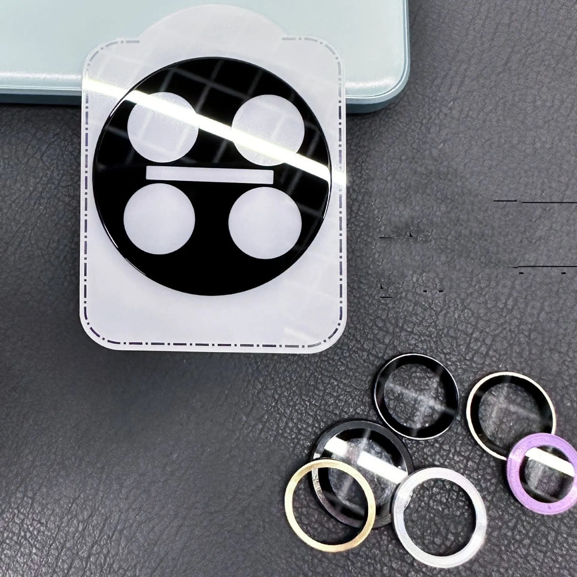 Large arc HD tempered glass lens protector with black alignment ring for OnePlus phones.