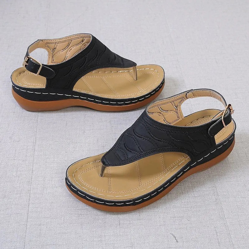 Women's wedge heel casual sandals in red with an adjustable back strap and flip-flop style.