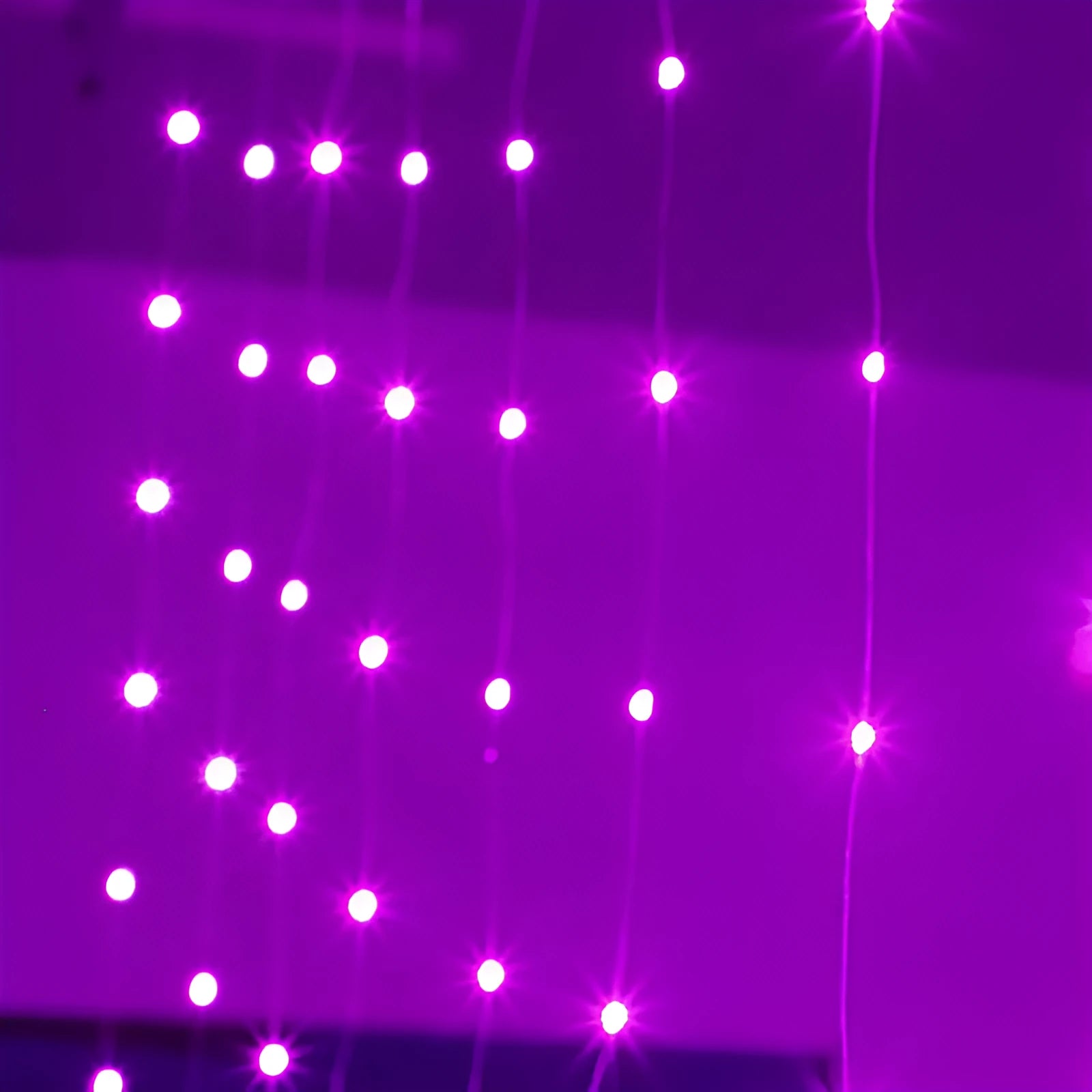 Copper curtain LED string lights with multiple beads, powered by USB cable, in a choice of colours.