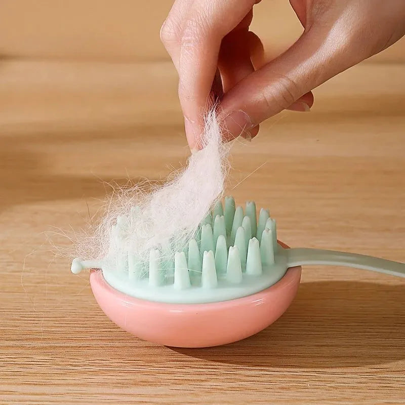 Silicone pet bathing brush with plastic handle in blue, pink, white, and yellow colour options