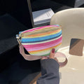 Blue woven straw beach bag with shell shape design and adjustable shoulder strap