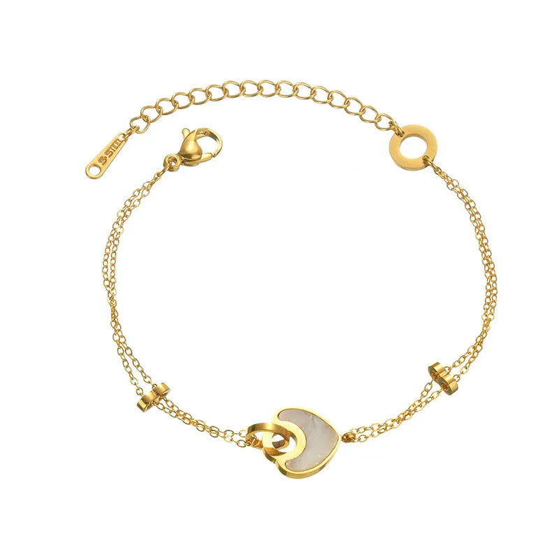 Silver stainless steel bracelet for women with a double-layer red resin heart charm.