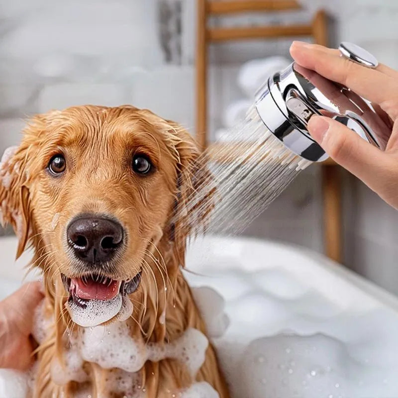 Silver dog shower attachment with silicone comb teeth and ergonomic grip for pet bathing