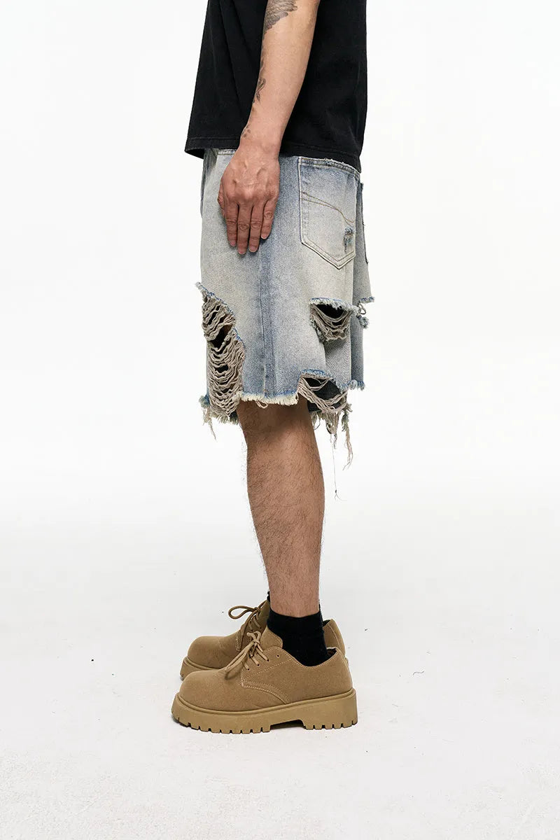 Men's light blue baggy denim shorts with retro washed finish and wide leg design