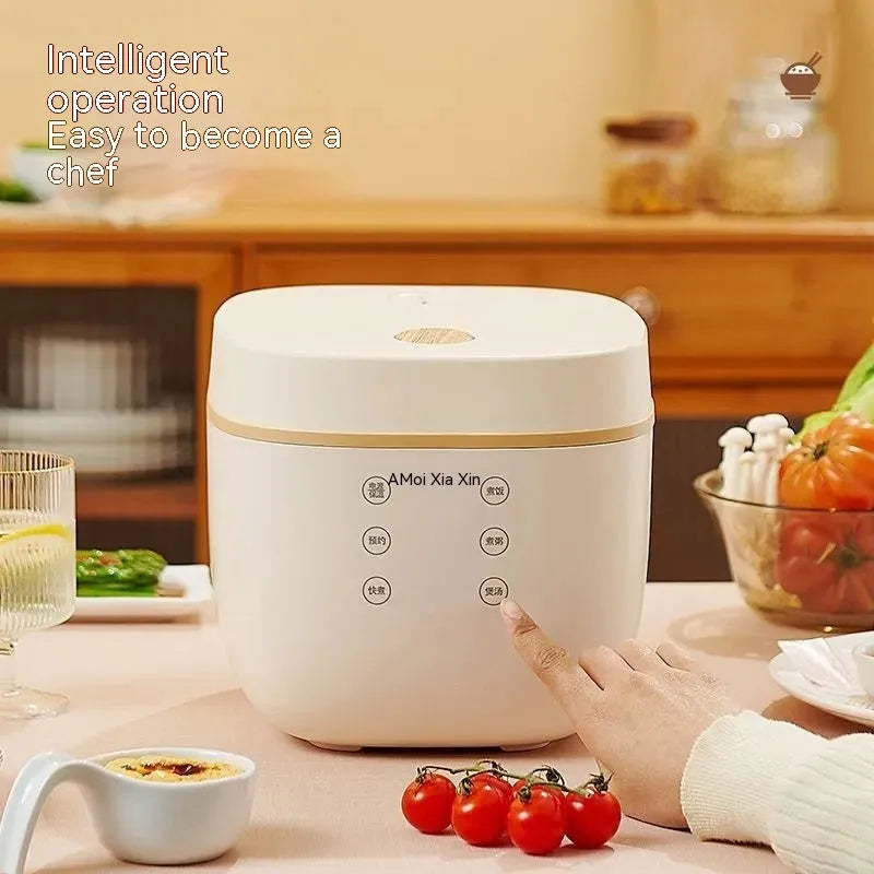 White or beige 3-litre rice cooker with black inner pot and included accessories