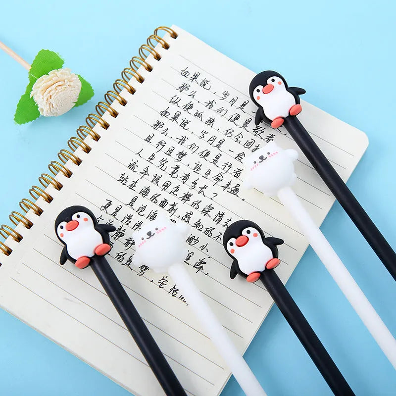 Peacock blue gel pen with cartoon penguin design and silicone grip, showing 0.5mm tip.