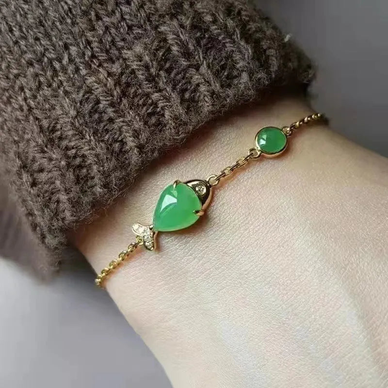 Copper retro-style bracelet with a yellow gold electroplated finish on a wrist.