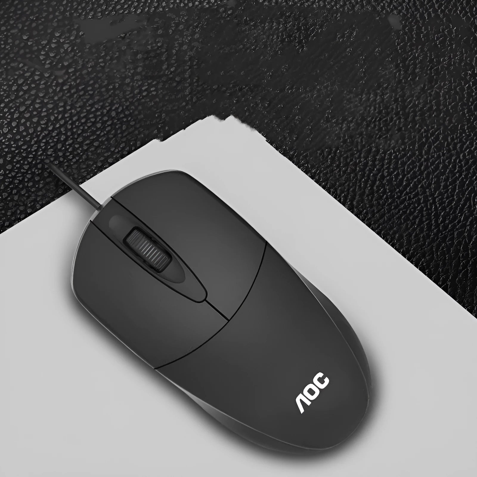 Black wired USB photoelectric mouse MS121 on a desk for home office or business use