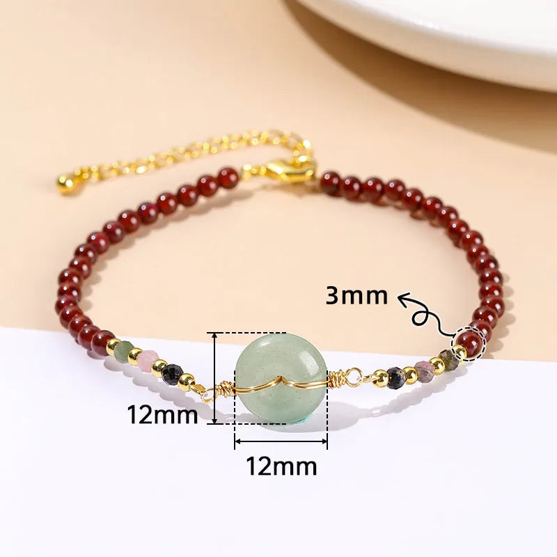 Women's Chinese crystal agate bracelet with round elements and garnet safety buckle