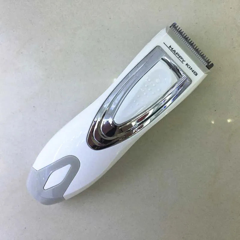 Children's barber scissors set with comb, limit combs, oil bottle, and brush in white