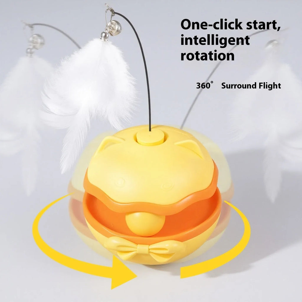Electric cat toy tumbler ball in soft fog grey colour, showing smooth plastic surface and on/off switch on base.