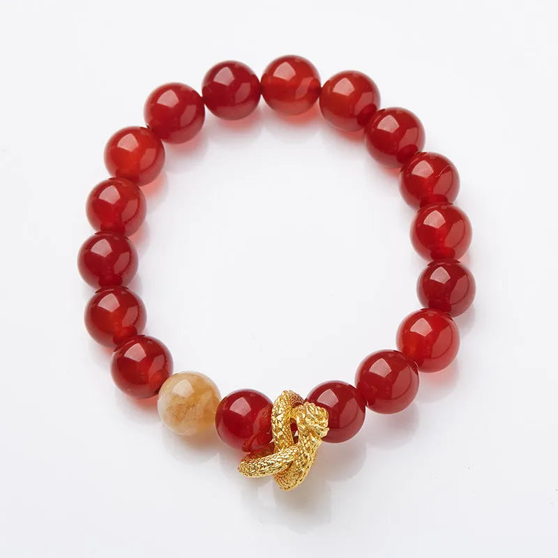Purple cornucopia nine purple good luck crystal bracelet with zodiac animal motifs on wrist