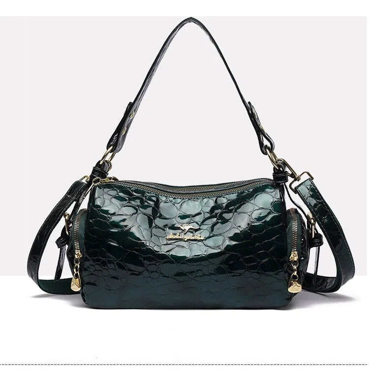 PU leather Boston pillow bag in khaki with stitched seams and stone pattern, double shoulder straps, internal pocket