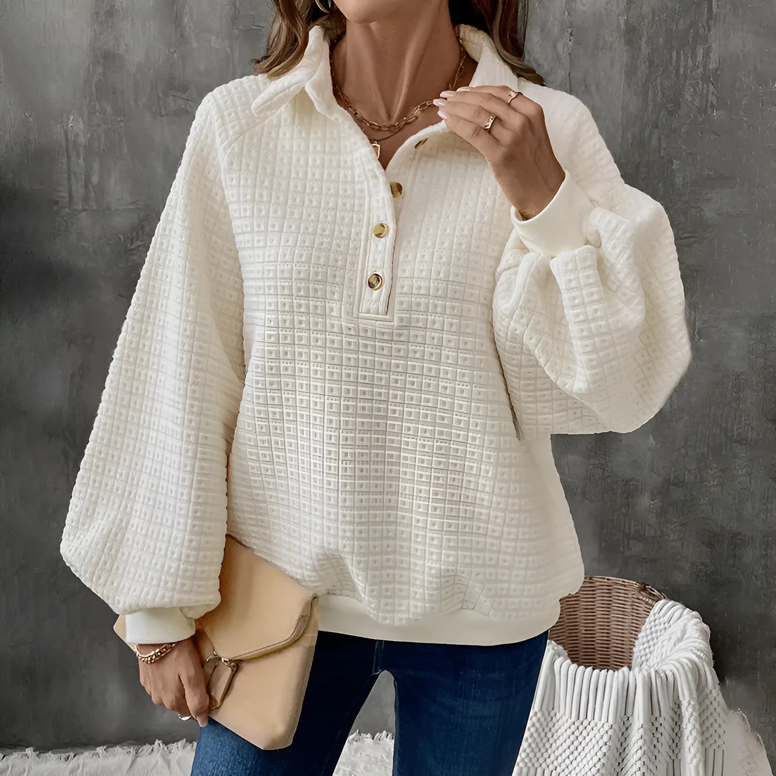 Milky white women's sweater with a textured polo collar and long sleeves