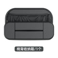 Black leather car seat storage bag with customisable compartments mounted on vehicle seatback