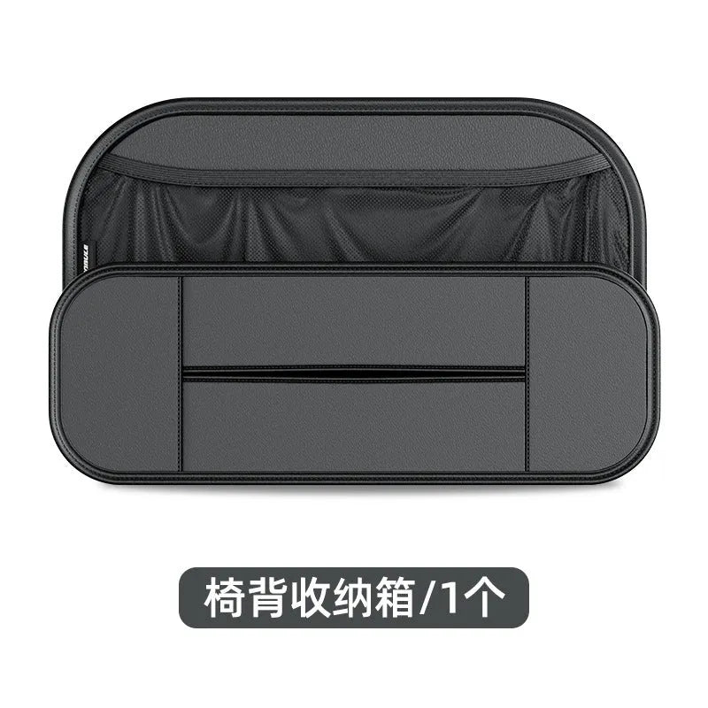 Black leather car seat storage bag with customisable compartments mounted on vehicle seatback