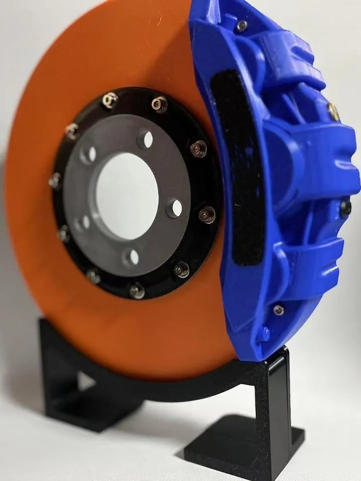 Brake disc design rechargeable LED night light with touch control in blue, red or yellow.