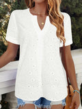 White loose V-neck T-shirt with decorative hollow-out pattern on the short sleeves.