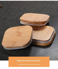 Square glass storage jar with bamboo wood lid, filled with coffee beans, 1000ml capacity