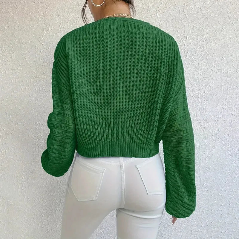 Women's solid colour long sleeve casual pullover in a loose fit, shown in various colours.