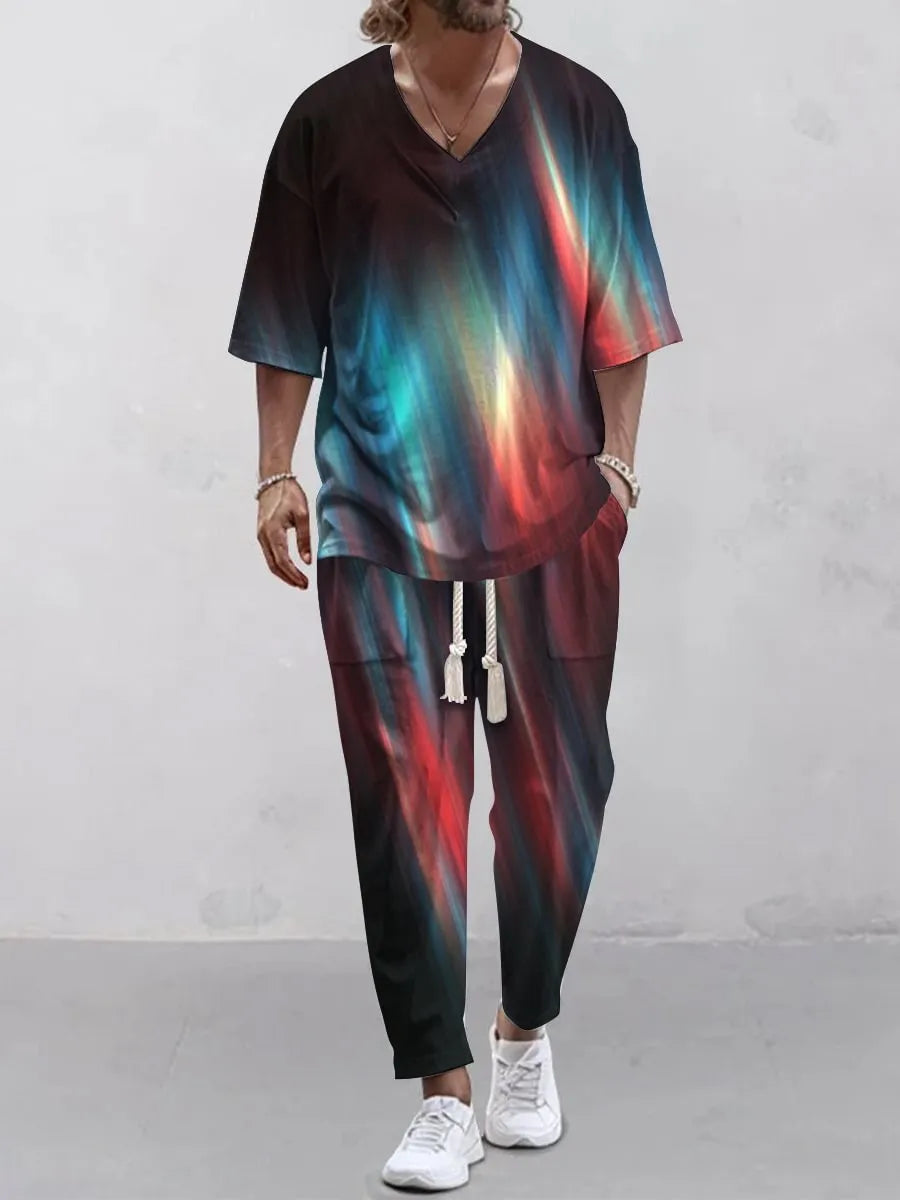 Lightweight cropped sleeve V-neck top and matching trousers suit in a solid colour.