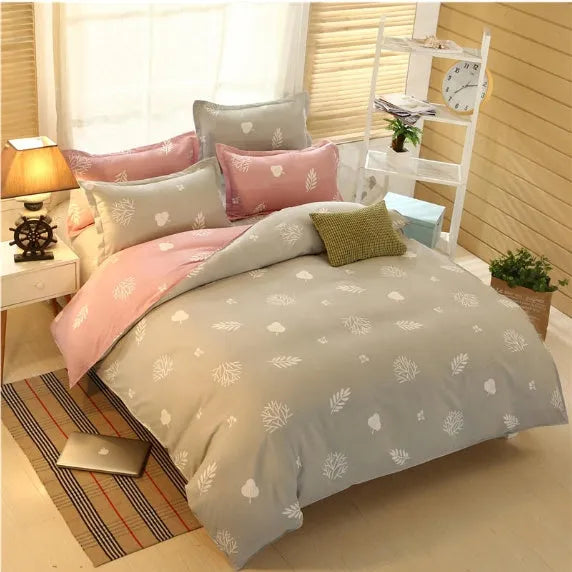 Four-piece polyester bedding set in a modern style for a 2m bed, shown in a choice of colours.