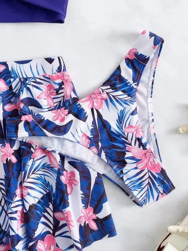 Women's three-piece high-waist bikini swimsuit in polyester fabric showing stomach coverage design