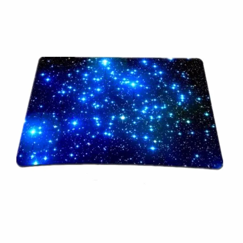 Blue star mouse pad with high-density fabric surface and anti-skid natural rubber base on a desk