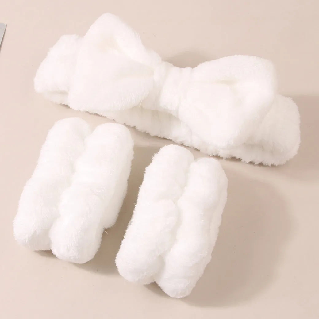 Three-piece facial skincare set showing a nylon brush and a coral fleece hair band in purple.