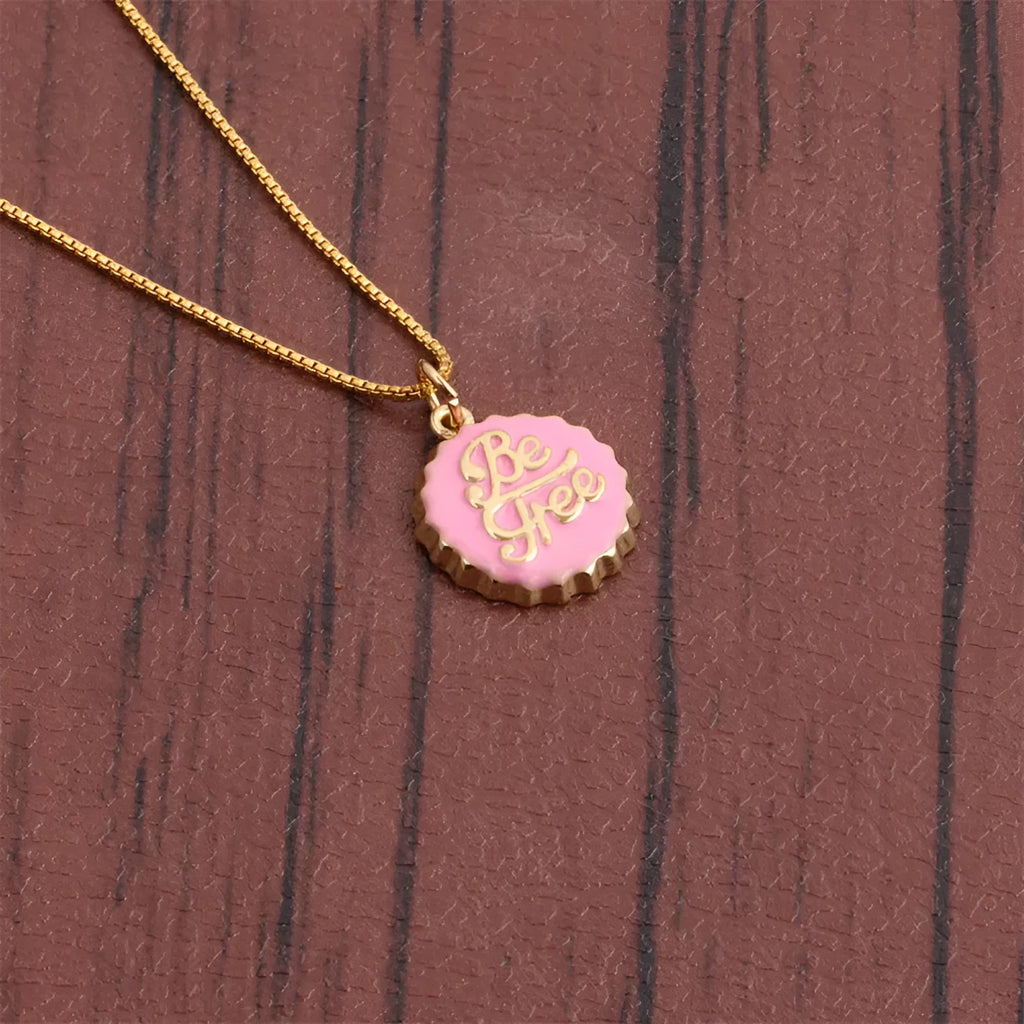 Copper bottle cap pendant necklace on a 40cm box chain with an 18K gold electroplated finish.