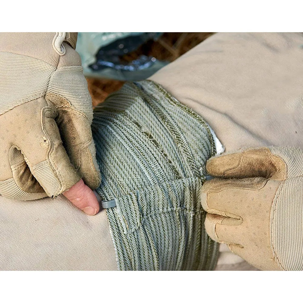 Outdoor hemostatic bandage and tactical gauze tape in 10cm and 15cm sizes laid flat.