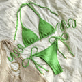 Women's halter lace-up bikini swimsuit in polyester fabric shown in milky white colour