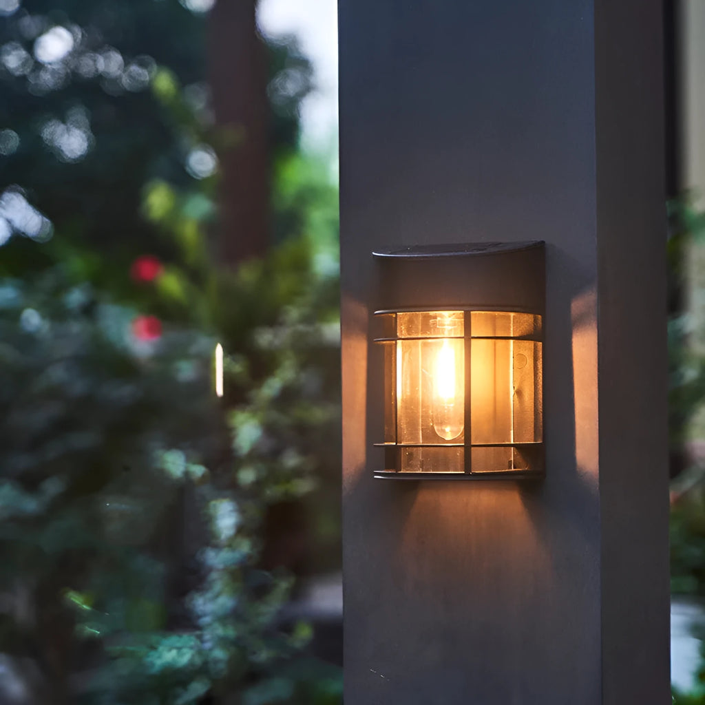 Set of 6 solar-powered outdoor wall lights with warm white illumination mounted on a garden wall