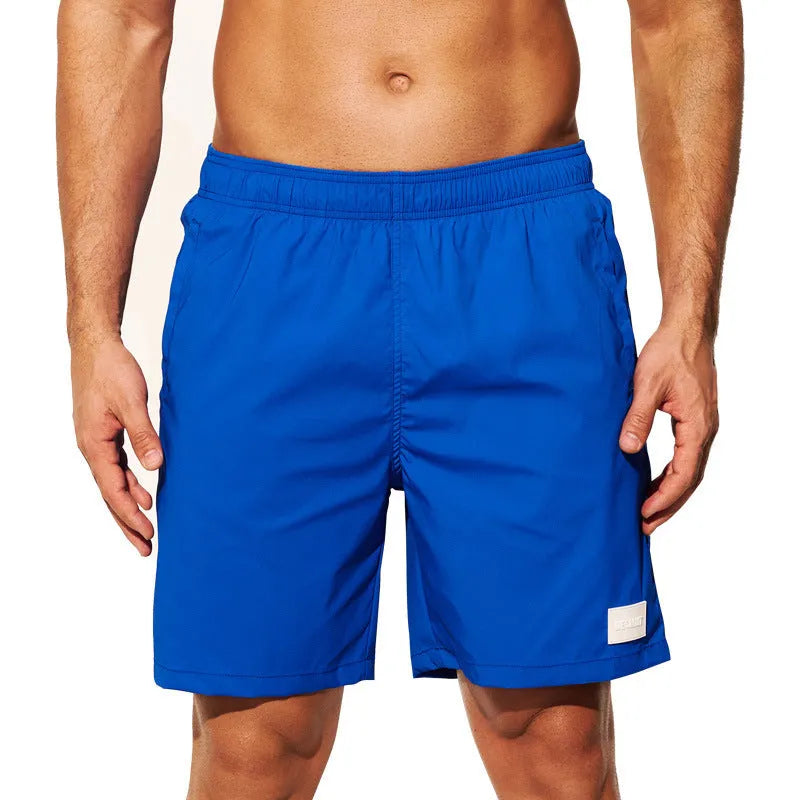 Men's quick-drying nylon sports shorts in blue with straight leg opening and high elasticity