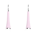 Pink and blue waterproof electric dental scaler tool on a bathroom counter with charging cable.