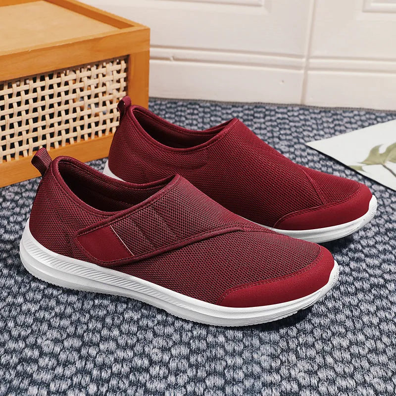 Summer walking shoes with mesh upper and Velcro closure in black, grey, blue, or wine red.